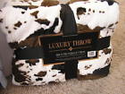 840106101467 Samss West Faux Cow Print