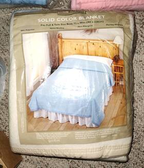 0-703335-1 Home Essentials Polyester Blanket Full/twin 72x90. Ivory Color With Satin Trim.