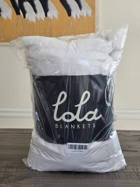 302-1018-03 Lola Blankets Size Medium Creamy Cloud 50 Inch X 60