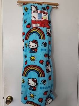 The Northwest Group 190604949987 Hello Kitty Ultra Fine Faux Fur Throw 50 Inch X 70 Rainbow Design Blue Red Yellow