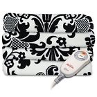 Tw8205-045-831 Whisper Black Channeled -ivory Microplush Rev. Htd Sunbeam Throw