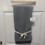 Queenwest Trading Co. Knit Grey Throw Blanket. 60 X 40 Brand New.. Fixed Price $6.00.