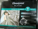 Beautyrest Black Weighted Blanket 15LBS Quilted 48" X 72" Color Beige. Fixed Price $64.99.