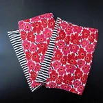 2 Marimekko Quilted Pillow Shams Standard Size Unikko Small Scale Red Pink. Fixed Price $56.00.
