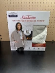 Sunbeam On-the-go Cordless Heated Throw Blanket Microplush Beige 4 Setting. Fixed Price $44.99.