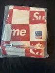 New Supreme Faribault Woolen Mill Checkerboard Throw FW21 Red Logo Blanket. Fixed Price $540.00.