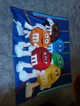 World Throw Blanket 50X60 Featuring M&ms Chocolate Candy Character Colors. Fixed Price $10.00.