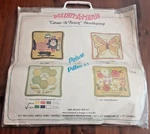 Vintage 1973 Design-a-mania Initial Flower Sampler Needlepoint Kit Hippy Pillow. Fixed Price $27.00.