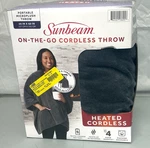 Sunbeam On-the-go Cordless Heated Throw Blanket Microplush Gray 4 Settings. Fixed Price $49.99.