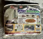 The Sherpa White Seen Tv Reversible Blanket Poncho Seat Cushion 84" X 58". Fixed Price $10.15.