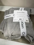 Calvin Klein Modern Lush Reversible Solid Blanket - Beige/pink King. Fixed Price $63.99.