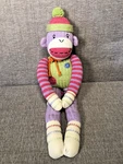 Sock Monkey Purple Green & Pink Seasons Of Cannon Falls Magnetic Hands/feet 20". Fixed Price $10.69.