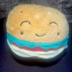 Members Mark 14 In Super Soft Cheeseburger Hugger Plush Toy Pillow. Fixed Price $30.00.