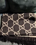 Gucci Wool Logo Rectangle Throw Blanket Tan/ Beige Tasseled Knit Designer. Fixed Price $400.00.