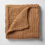 50"X70" Oversized Solid Bed Throw Warm Brown - Casaluna. Fixed Price $34.99.
