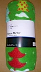 Mainstay Green With Red/blue/yellow Christmas Trees Theme 50X60 Fleece Throw. Fixed Price $13.00.