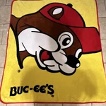 Buc-ee's Throw Blanket Yellow Red Beaver Mascot Pictorial Rectangular Novelty. Fixed Price $35.00.