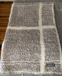 Barefoot Dreams Cozychic Grid Plaid Stroller Blanket, Cream/beach Rock, 30X40. Fixed Price $27.00.