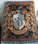 Harry Potter Hufflepuff Crest Badger Tapestry Woven Blanket 48X60 Warner Bros.. Fixed Price $15.00.