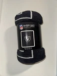 Oakland Raiders Micro Throw Raschel 46" X 60" Blanket Nip Black Logo. Fixed Price $25.00.
