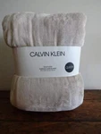 Calvin Klein Light Beige Plush Fleece Oversized Queen Blanket. Fixed Price $69.99.