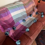 Anthropologie Pommed Plaid Throw Blanket 64X75 Boho Textured Blue Poms. Fixed Price $39.99.