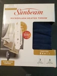 Sunbeam Microplush Electric Heated Throw Blanket Navy Blue. Fixed Price $44.99.
