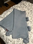 60X70 Inch Light Blue Knit Throw Blanket With Large Poms. Fixed Price $27.00.
