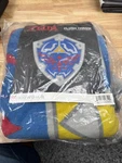 Bioworld Nintendo Legend Of Zelda Hylian Shield Shaped Plush Throw Blanket Nib. Fixed Price $94.99.